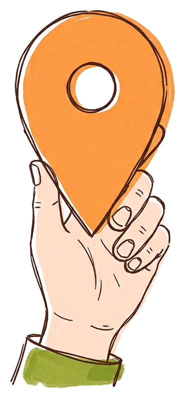 Une main tenant un repère de carte orange